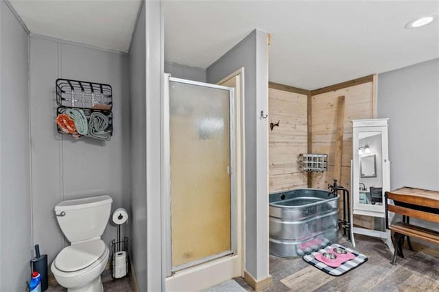 437 Crabapple Rd, Dahlonega, GA 30533 - full bath with a stall shower, a garden tub, wood finished floors, and wood walls