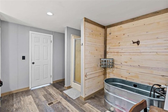 437 Crabapple Rd, Dahlonega, GA 30533 - full bathroom with wood finished floors, a stall shower, and recessed lighting