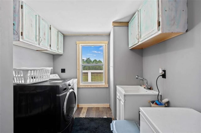 437 Crabapple Rd, Dahlonega, GA 30533 - washroom with cabinet space, washing machine and dryer, and wood finished floors