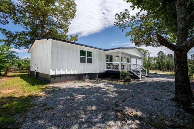 437 Crabapple Rd, Dahlonega, GA 30533 - manufactured / mobile home with a porch and board and batten siding