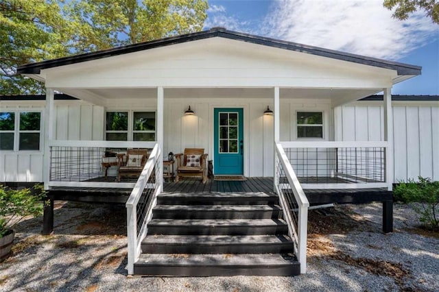 437 Crabapple Rd, Dahlonega, GA 30533 - view of front of house featuring board and batten siding and a porch