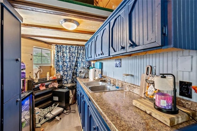 437 Crabapple Rd, Dahlonega, GA 30533 - kitchen with blue cabinetry and beam ceiling