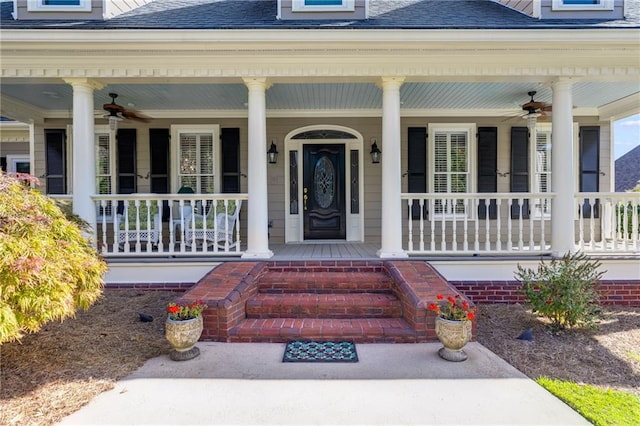 doorway to property featuring ceiling fan and covered porch