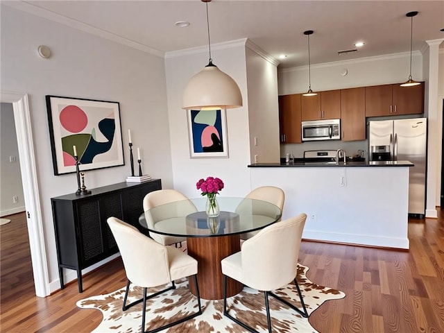 384 Ralph Mcgill Blvd NE Unit 121, Atlanta, GA 30312 - living room featuring plenty of natural light, baseboards, and wood finished floors