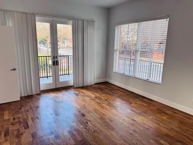 384 Ralph Mcgill Blvd NE Unit 121, Atlanta, GA 30312 - interior space featuring plenty of natural light, french doors, wood finished floors, and baseboards