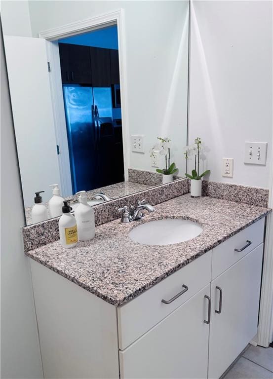 384 Ralph Mcgill Blvd NE Unit 121, Atlanta, GA 30312 - bathroom featuring tile patterned floors and vanity