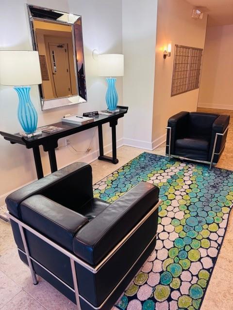 384 Ralph Mcgill Blvd NE Unit 121, Atlanta, GA 30312 - sitting room featuring baseboards and tile patterned floors