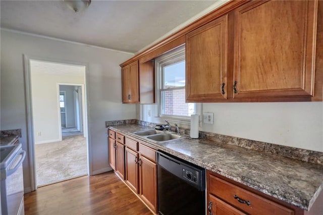 kitchen with range with electric cooktop, wood finished floors, a sink, black dishwasher, and brown cabinetry