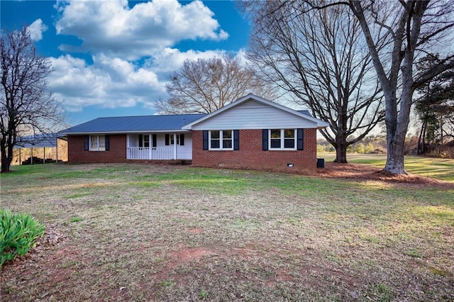 view of front of house with crawl space, a front lawn, a porch, and brick siding