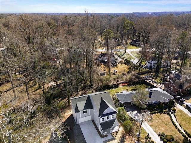 bird's eye view featuring a view of trees