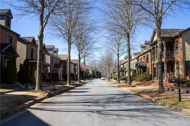 3780 Baxley Pine Trl, Suwanee, GA 30024 - view of asphalt road featuring a residential view, curbs, and sidewalks