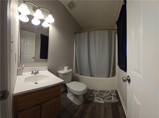 full bathroom featuring vaulted ceiling, shower / bath combo, toilet, vanity, and wood-type flooring