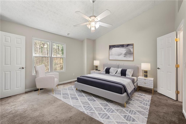 carpeted bedroom featuring baseboards, a textured ceiling, lofted ceiling, and a ceiling fan