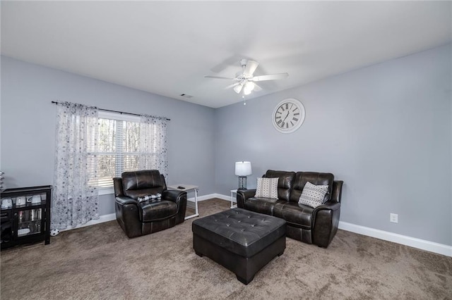 living room with ceiling fan and carpet flooring