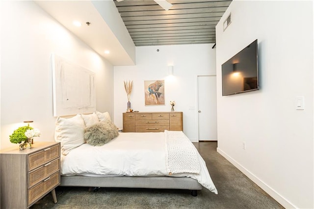 bedroom with recessed lighting, baseboards, visible vents, and dark carpet