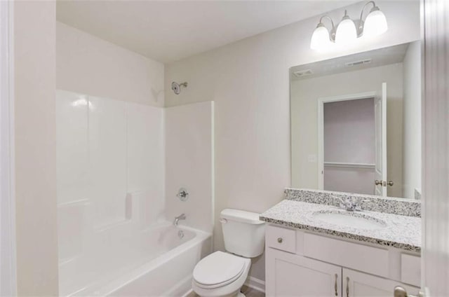 full bathroom featuring vanity, toilet, and bathtub / shower combination