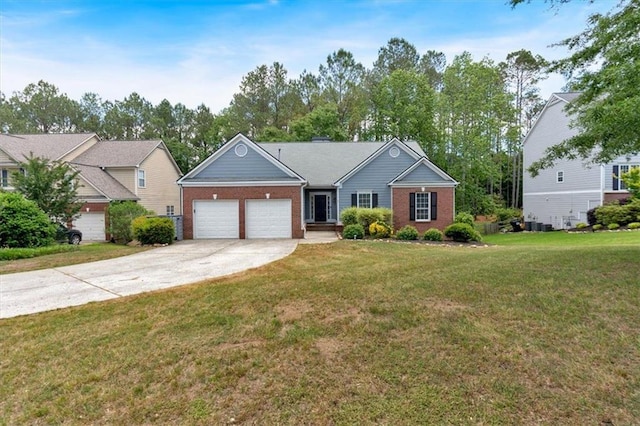ranch-style home featuring a garage, brick siding, driveway, and a front lawn