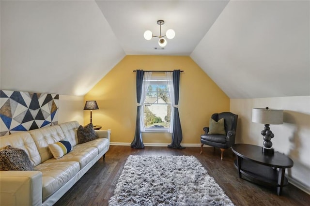 living room featuring vaulted ceiling and dark hardwood / wood-style floors