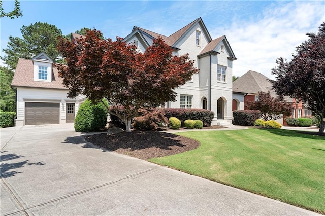 183 Applewood Ln, Acworth, GA 30101 - view of front of home with concrete driveway, a front lawn, and a garage