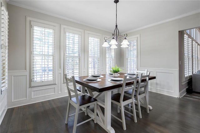 183 Applewood Ln, Acworth, GA 30101 - dining space with a decorative wall, a chandelier, dark wood-type flooring, plenty of natural light, and crown molding