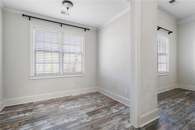 empty room with dark wood-type flooring and ornamental molding