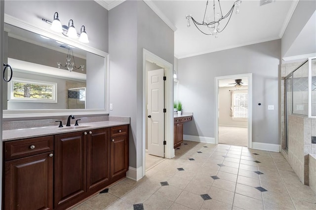 183 Applewood Ln, Acworth, GA 30101 - bathroom featuring a chandelier, ornamental molding, vanity, a shower stall, and plenty of natural light