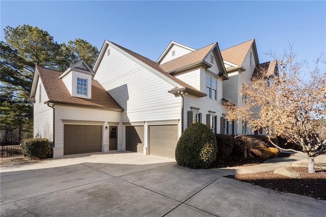 view of property exterior featuring a garage