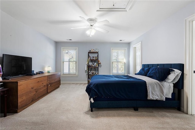 carpeted bedroom with ceiling fan