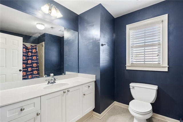 bathroom featuring vanity, tile patterned flooring, toilet, and a shower with shower curtain