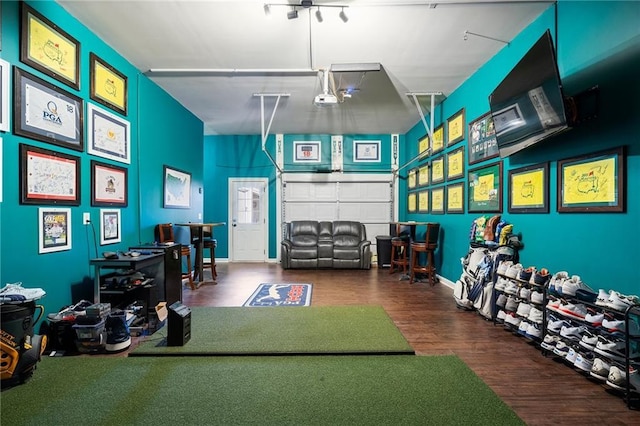 game room with hardwood / wood-style flooring