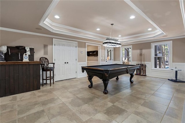 rec room with crown molding, a tray ceiling, and billiards