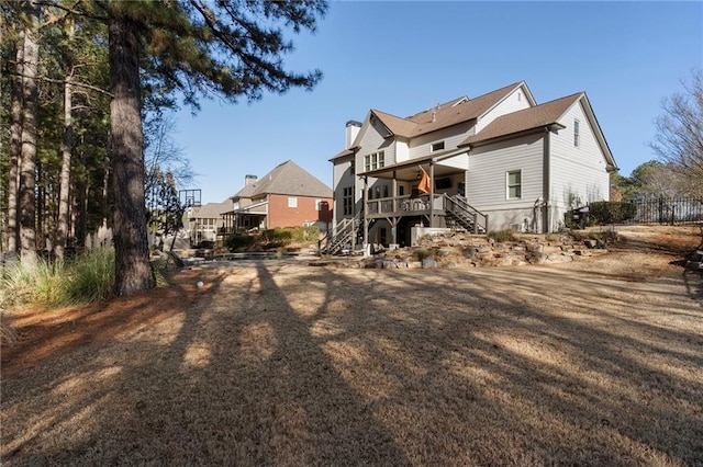 183 Applewood Ln, Acworth, GA 30101 - rear view of house with stairway and a deck