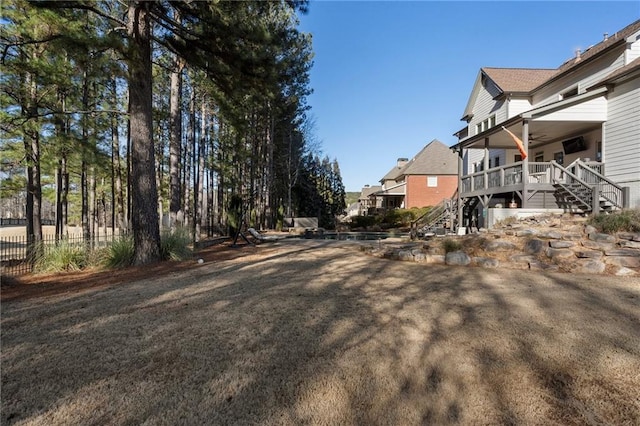 view of yard featuring ceiling fan