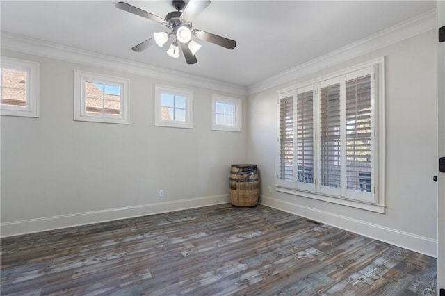 spare room with ornamental molding, dark hardwood / wood-style floors, and ceiling fan