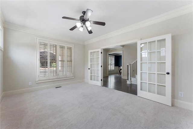 183 Applewood Ln, Acworth, GA 30101 - unfurnished room featuring french doors, carpet floors, ornamental molding, baseboards, and ceiling fan
