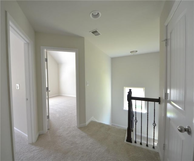 2307 Overlook Ave, Lithonia, GA 30058 - corridor featuring an upstairs landing, carpet, and baseboards