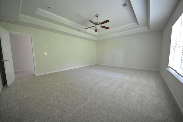 2307 Overlook Ave, Lithonia, GA 30058 - empty room with a tray ceiling, a ceiling fan, carpet, ornamental molding, and baseboards