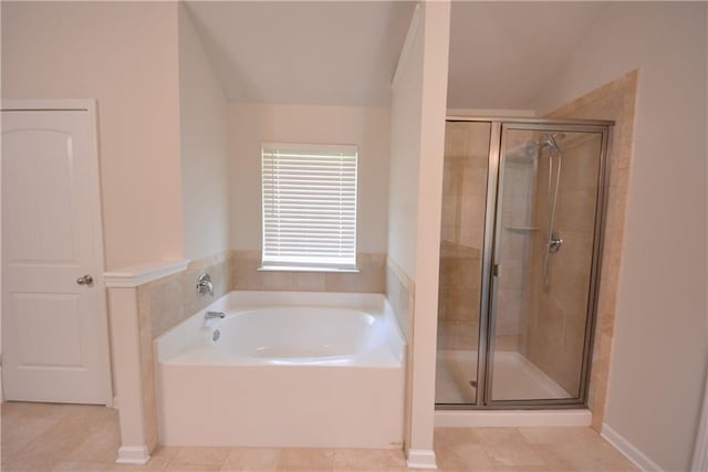 2307 Overlook Ave, Lithonia, GA 30058 - full bath with a garden tub, a stall shower, and tile patterned flooring