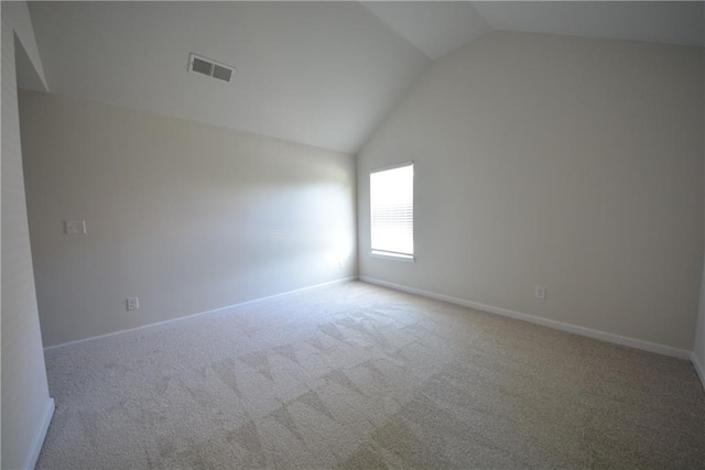 2307 Overlook Ave, Lithonia, GA 30058 - unfurnished room with vaulted ceiling, carpet floors, and baseboards