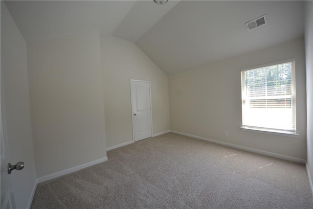 2307 Overlook Ave, Lithonia, GA 30058 - bonus room featuring carpet flooring, vaulted ceiling, and baseboards
