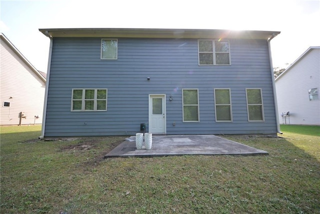 2307 Overlook Ave, Lithonia, GA 30058 - rear view of house with a patio area and a lawn