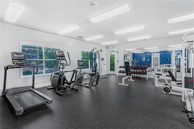 exercise room with baseboards