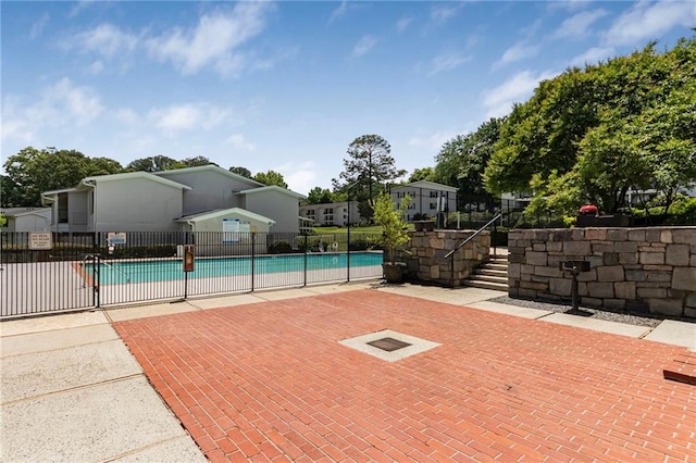 community pool with fence