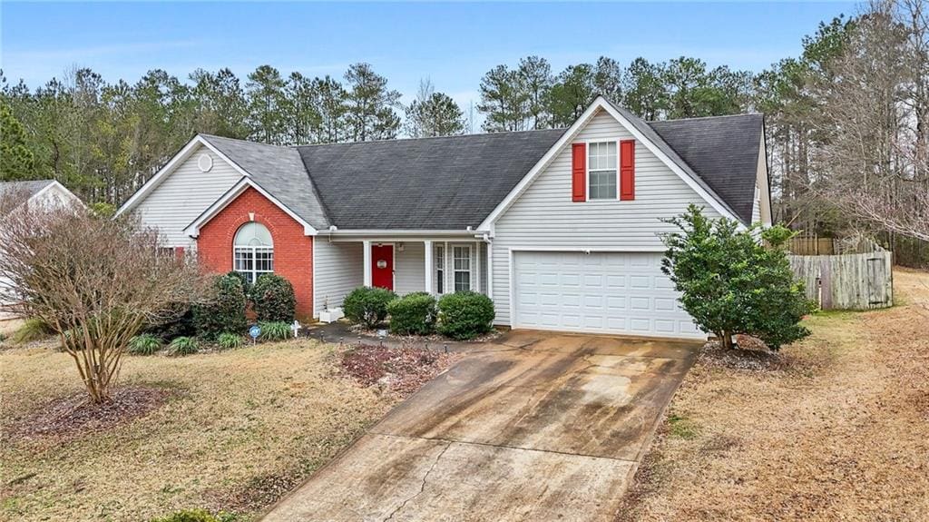 view of front of property featuring a garage