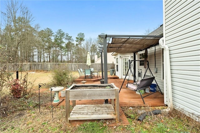 view of yard with a wooden deck and a pergola