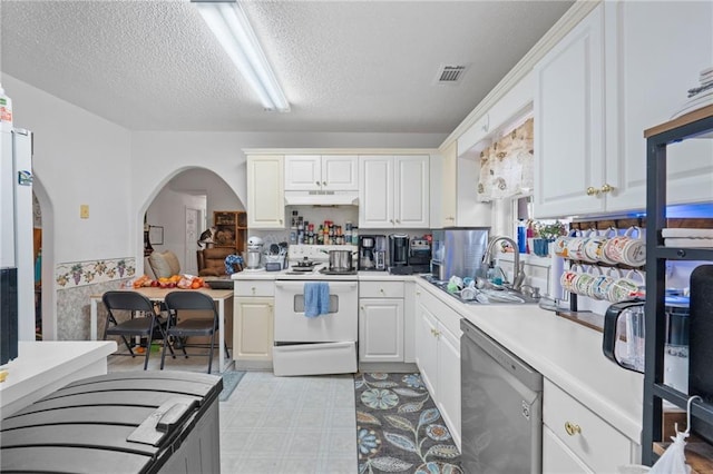 kitchen featuring sink, white range with electric cooktop, white cabinetry, a textured ceiling, and stainless steel dishwasher