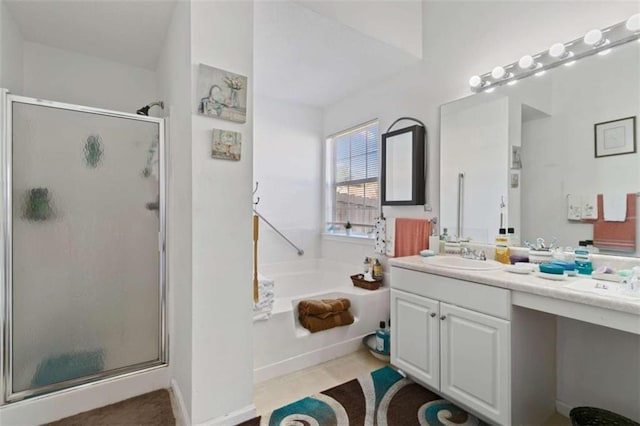 bathroom featuring tile patterned floors, vanity, and plus walk in shower