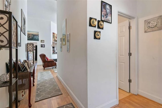 hallway featuring light hardwood / wood-style flooring