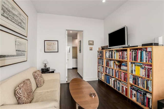 living area with dark wood-type flooring