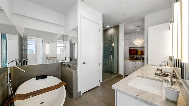 bathroom with vanity and plus walk in shower